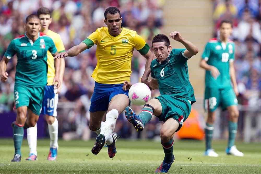 Past champions clash as Mexico battle Brazil