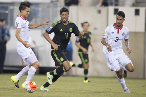 Carlos Vela of Mexico # 11 and Giancarlo Gonzalez of Costa Rica #3