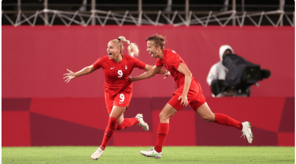 Canada draw Great Britain to reach knockout round