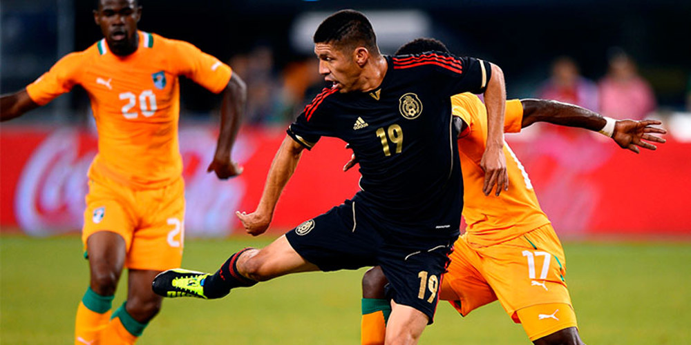 Peralta scores twice, propels Mexico past Ivory Coast