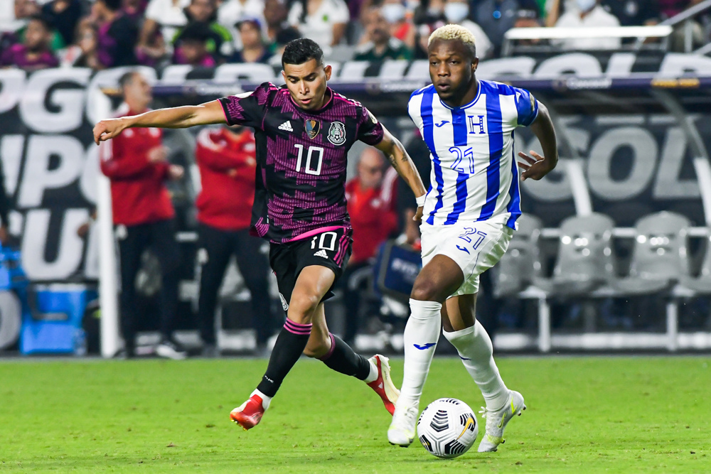 First half explosion launches Mexico past Honduras